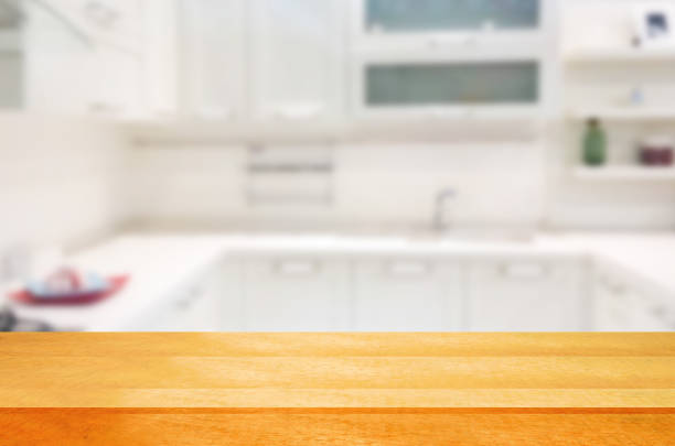 istock Empty wooden table and blurred kitchen background.can be used for montage or display your products. 852411900