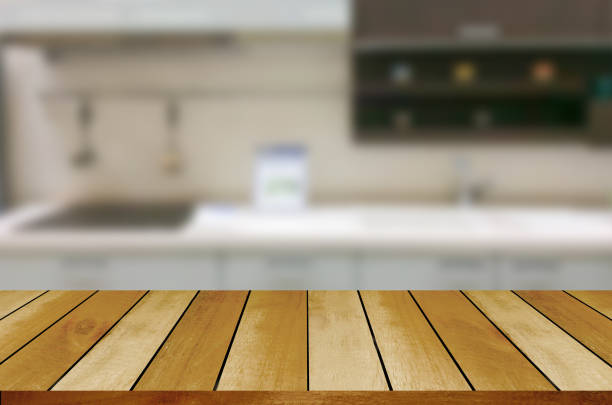 istock Empty wooden table and blurred kitchen background.can be used for montage or display your products. 852411912