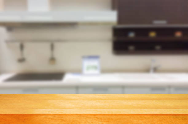 istock Empty wooden table and blurred kitchen background.can be used for montage or display your products. 852411914