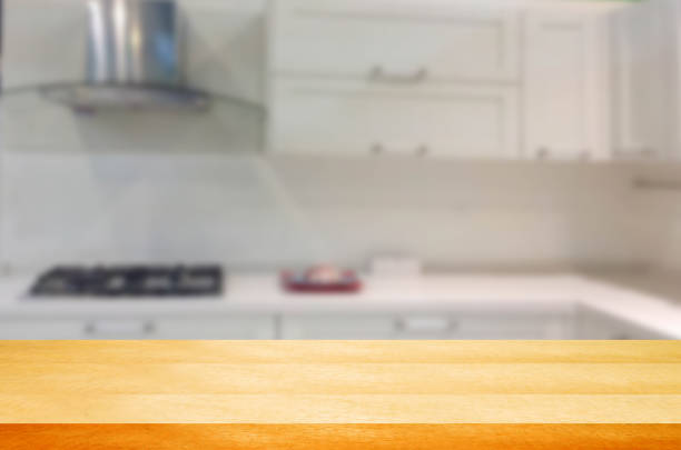 istock Empty wooden table and blurred kitchen background.can be used for montage or display your products. 852411920