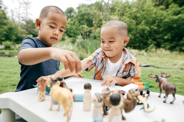 istock Children playing with dolls and toys 852412276
