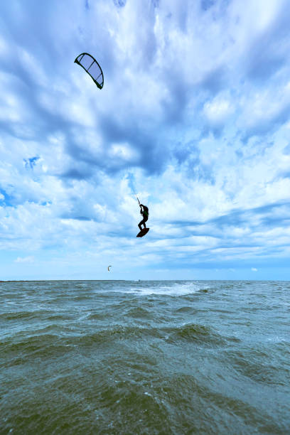 istock Kite Surfing on waves at sea in summer. 852419024