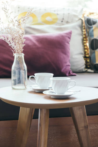 istock flower vase on table decoration with pillow and sofa 852439208