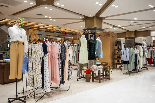istock fashionable clothes in modern shopping mall 852439662