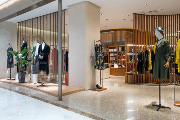 istock fashionable clothes in modern shopping mall 852439746