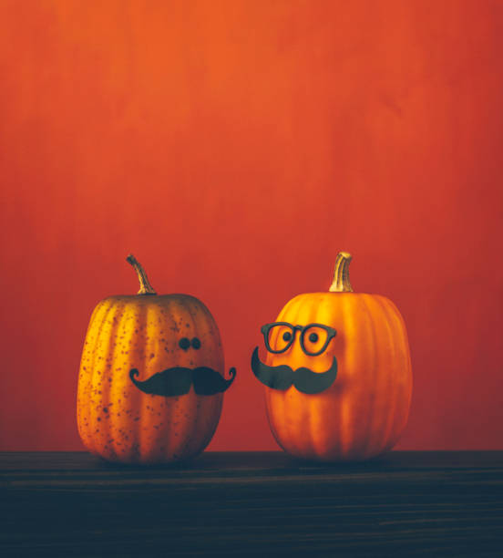 istock Cute pumpkin halloween characters face to face 852442306