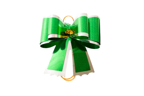 istock Green ribbon bow isolated on white background. Holidays decoration. 852459374