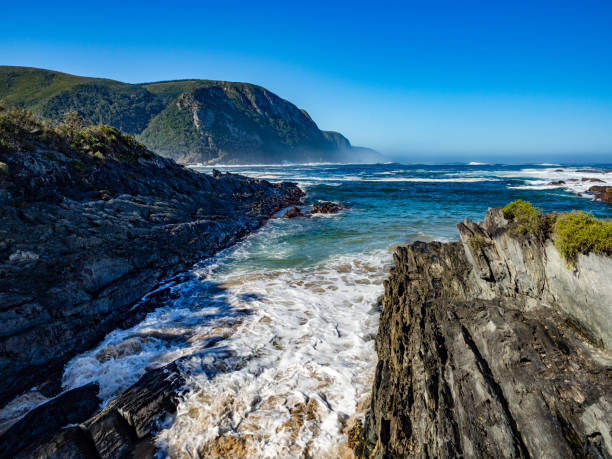 Rugged shoreline at trail from Lookout Point at Storms RIver Suspension Bridge,  Tsitsikamma National Park, Garden Route, Western Cape, South Africa
