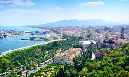 Malaga cityscape with Cathedral of Malaga and harbor, Spain