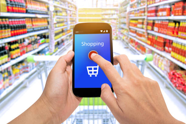 istock Man use mobile phone with blur store and address bar,Shopping Purchase Order Concept 852482624