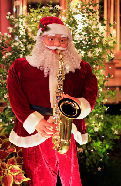 istock Toy Santa Claus playing on a saxophone 852485126