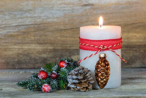 istock Advent Christmas candle with natural decor 852498090
