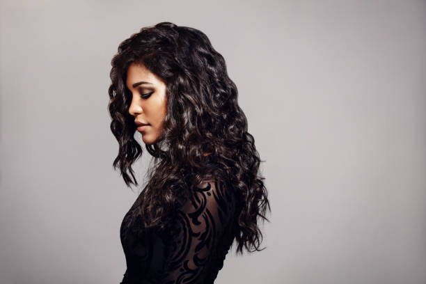 istock Attractive young woman with curly hair 852499266