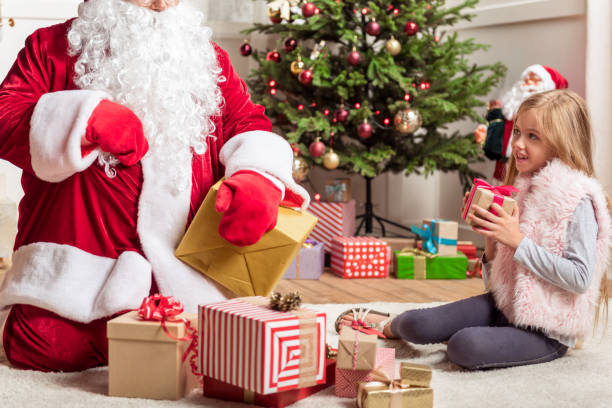 istock Curious female kid getting Christmas presents 852509388
