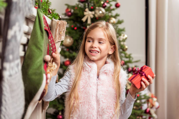 istock Cheerful child taking holiday gifts 852511814