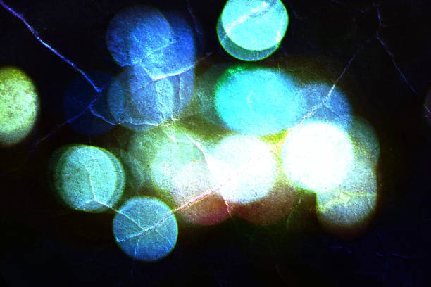 istock Abstract circular defocused blurred bokeh lights on the texture of the stone. 852517382