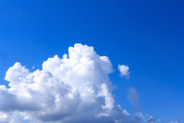 istock Blue sky background with white clouds, rain clouds on sunny summer or spring day. 852525058