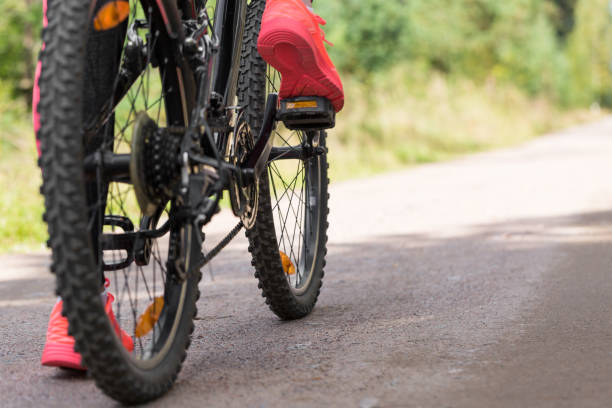 istock Woman riding a mountain bicycle 852525632