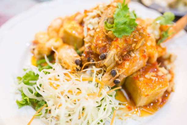 istock Fried prawns on a plate, Thai seafood. 852532380