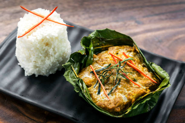 traditional Cambodian khmer fish amok curry meal traditional Cambodian khmer fish amok curry meal cambodian culture photos stock pictures, royalty-free photos & images