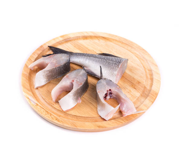 istock Fillet of fresh raw fish on a cutting board. 852547408