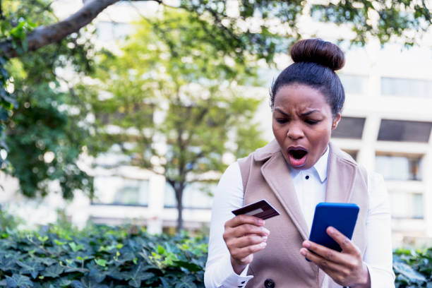istock Shocked at the limited funds she found on her credit card, causing her online shopping transaction to decline. 852562396