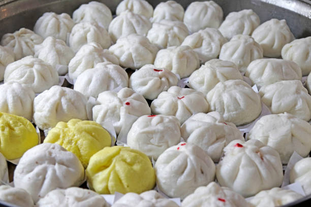 Vegetable Chinese Steamed Buns or Mantou Recipe on bamboo basket.