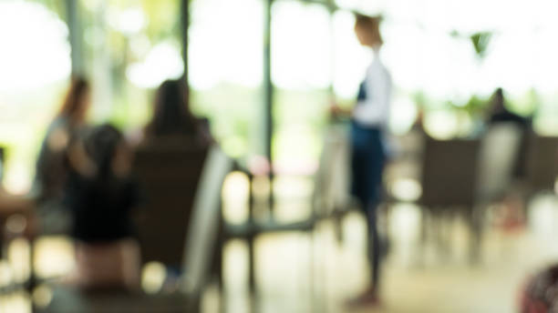 istock Blurred background of restaurant with people 852571670