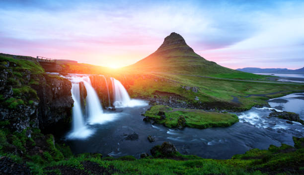 istock Colorful sunrise on Kirkjufellsfoss waterfall 852578612