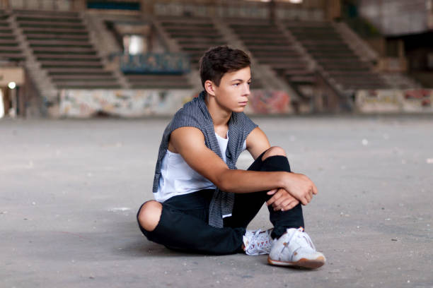 istock Serious young man in an old stadium 852605702