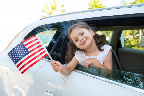 istock Girl Holding American Flag 852609990