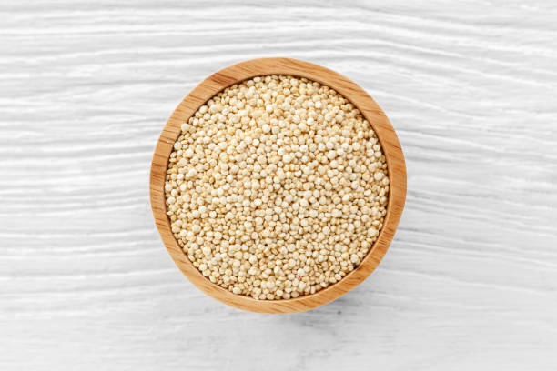 istock Quinoa seeds on wooden background 852613208