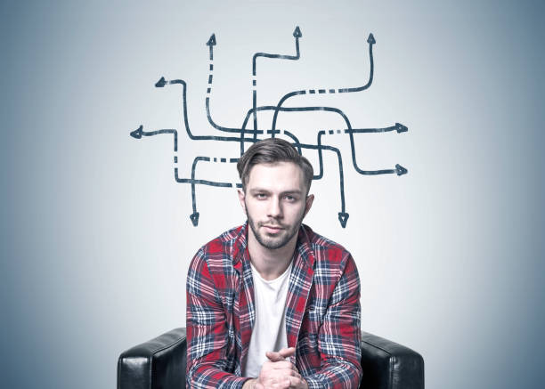 istock Bearded man in armchair, arrow maze 852625616