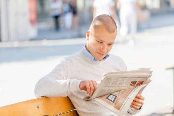 istock Young man  reads the newspapers 852642360