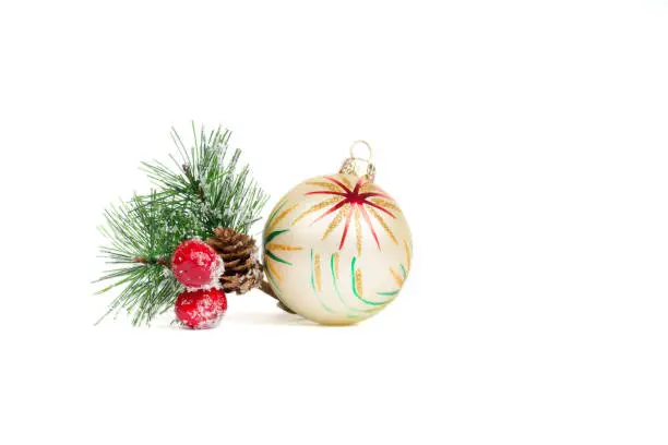 christmas bauble with red star and pine branch isolated on white background, xmas template
