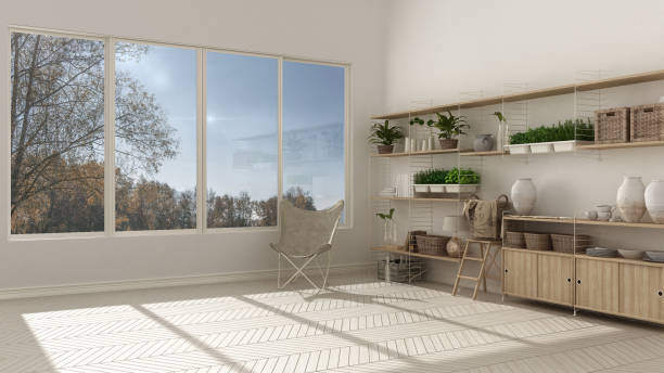istock Eco white interior design with wooden bookshelf, diy vertical garden storage shelving, panoramic window with autumn garden, mountain panorama 852679828