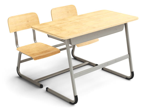 Generic wooden school desk isolated on white background.
