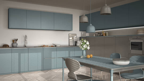 istock Modern kitchen with table and chairs, big windows and herringbone parquet floor, white and air force blue minimalist interior design 852697068