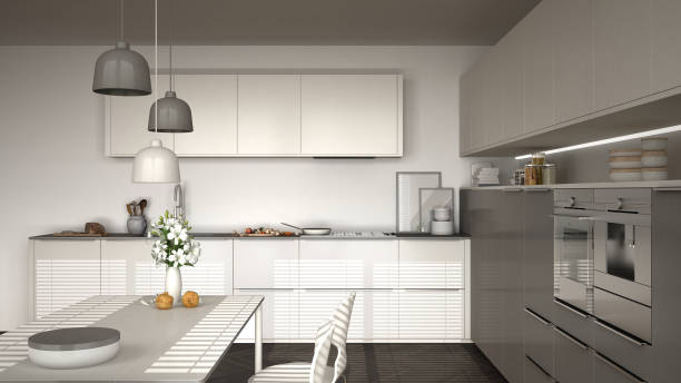 istock Modern kitchen with table and chairs, herringbone parquet floor, white and gray minimalist interior design 852706830
