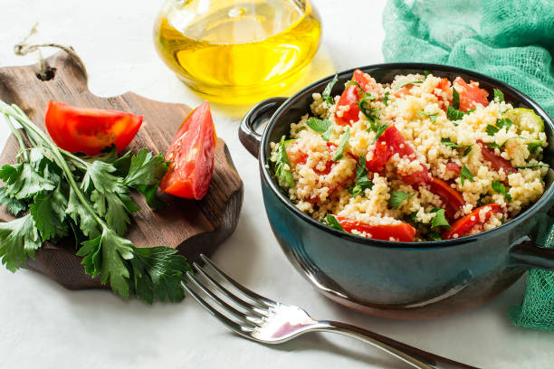 istock Bowl with couscous, vegetables and herbs 852706994