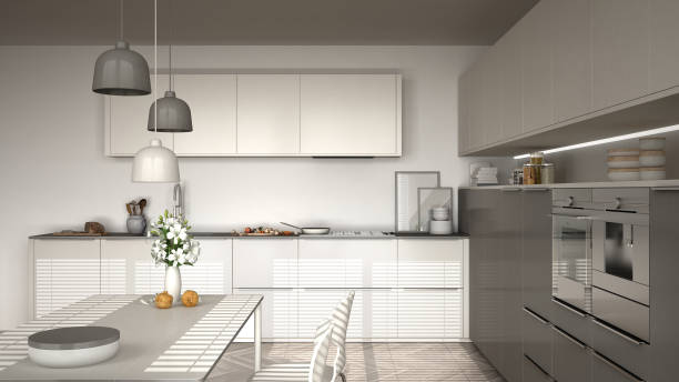 istock Modern kitchen with table and chairs, herringbone parquet floor, white minimalist interior design 852707054