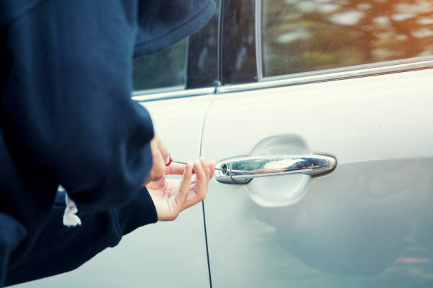 istock close up of car thief in action 852710320