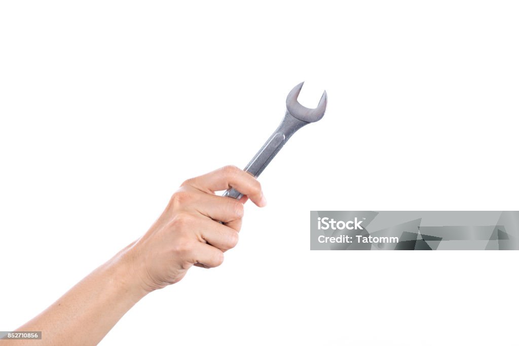 Mechanic engineer hand hold spanner tool in hand isolated on white background Open End Wrench Stock Photo