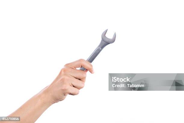 Mechanic Engineer Hand Hold Spanner Tool In Hand Isolated On White Background Stock Photo - Download Image Now