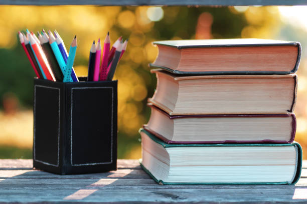 istock autumn book stack wooden outdoor 852727270