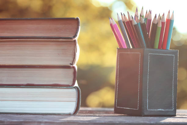 istock autumn book stack wooden outdoor 852727522