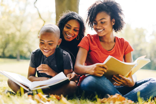 istock mother helping the kids doing the homework 852732526