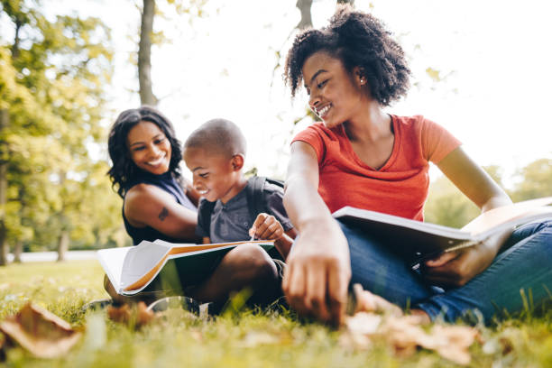istock mother helping the kids doing the homework 852733186