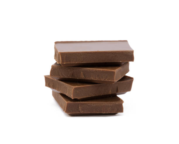 istock Milk chocolate pieces isolated on white background 852743002
