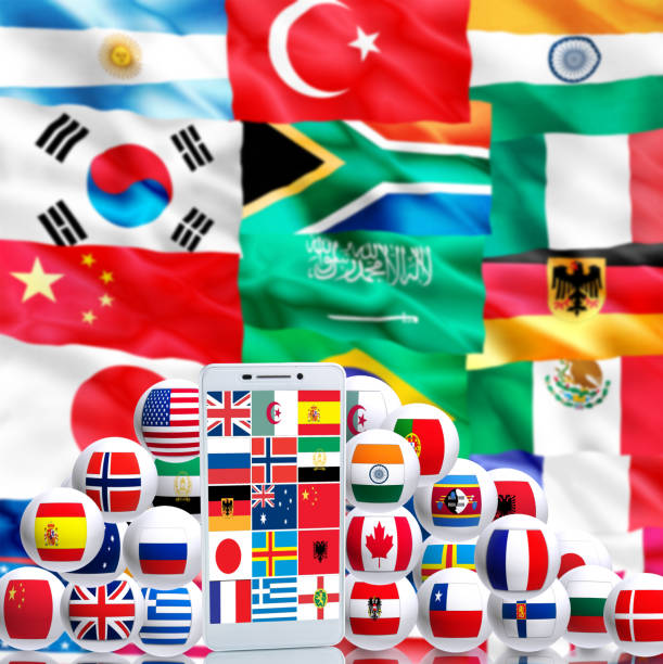 istock image of stylized flags of different countries and mobile phone close-up 852744444